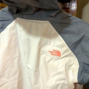 The North Face women’s wind breaker Jacket